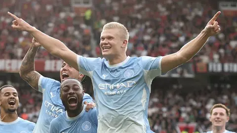 Erling Haaland Seals Dramatic Manchester Derby Victory for Ten-Man City